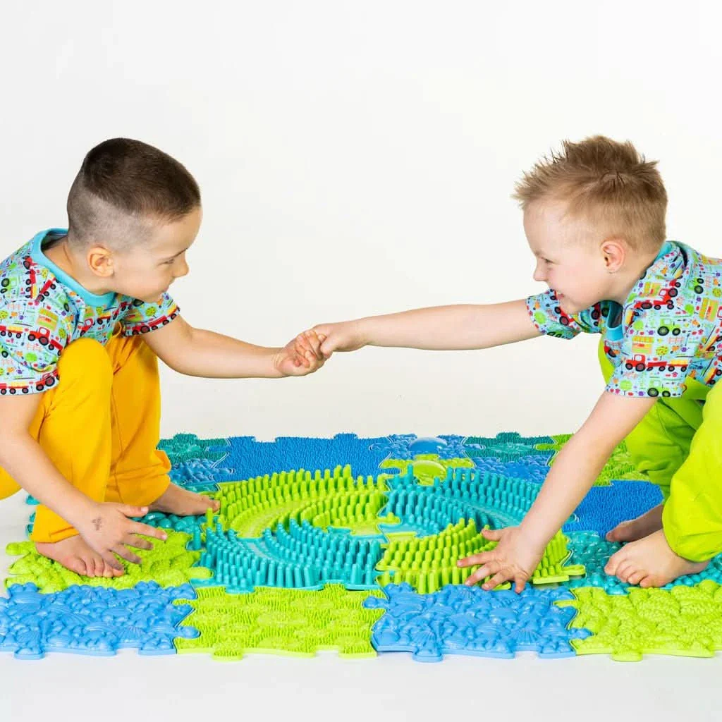 De sensorische puzzelmatten oceaan set vertegenwoordigt een mooie basiscollectie van de speelmatten van Muffik. Een geweldig blote voetenpad!