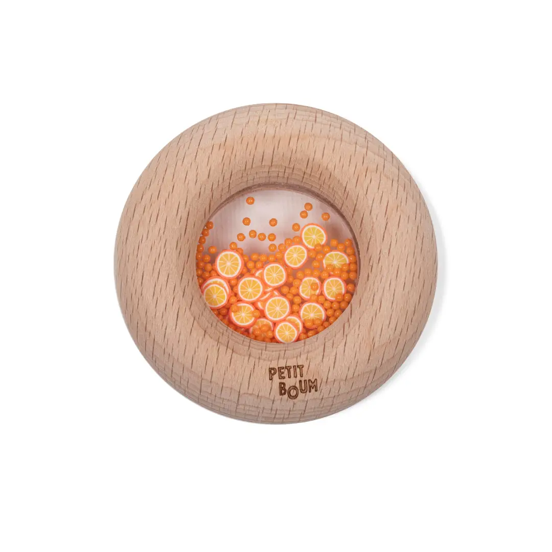 Der sensorische Donut Petit Boum stimuliert und stimuliert die Sinne von Kleinkindern.
