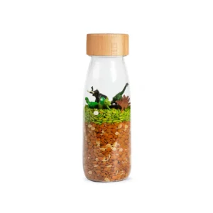 Die sensorische Flasche Petit Boum Jurassic regt die Fantasie mit realistischen Dinosauriern an. Ideal zum spielerischen Lernen und wohltuenden Entdecken.